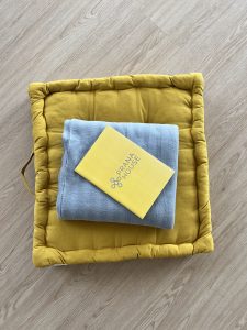 Meditation cushion, journal and blanket