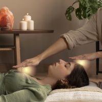 side-view-therapist-helping-woman-with-healing side-view-therapist-helping-woman-with-healing